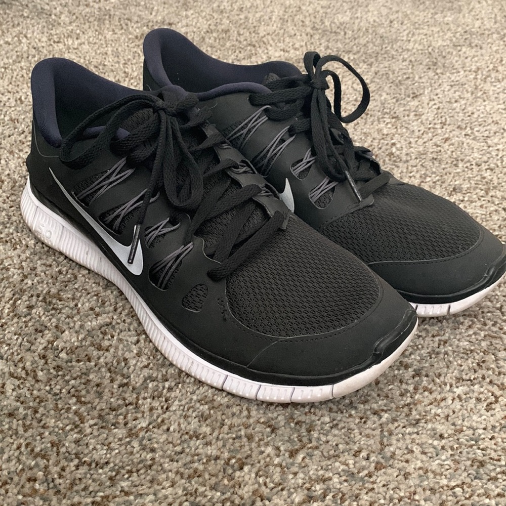 Black Nike running shoes